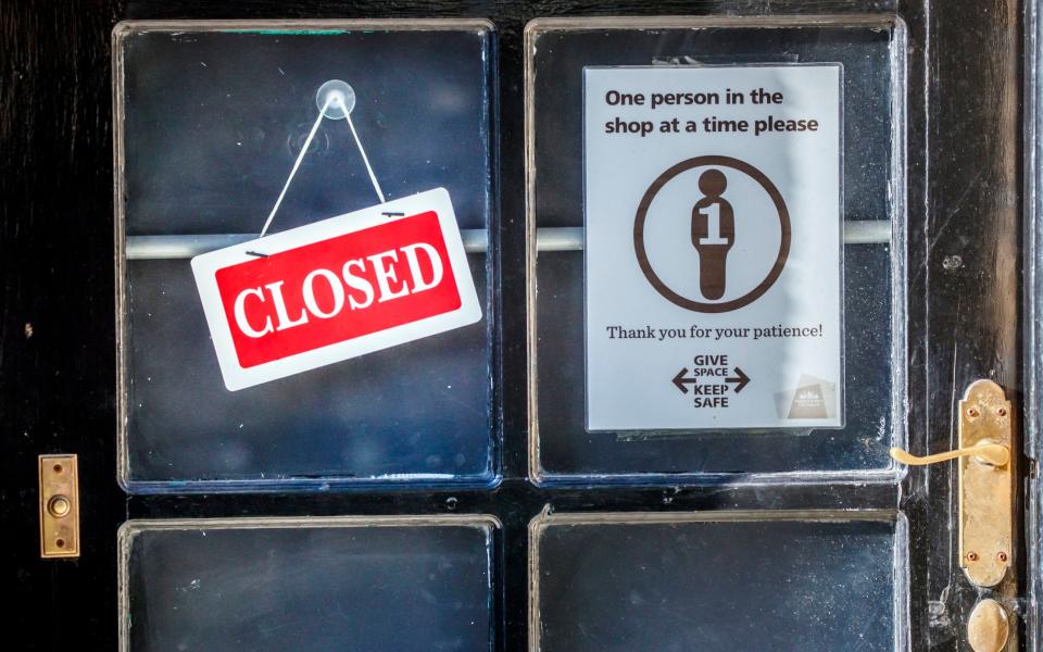 A closed sign in a shop window