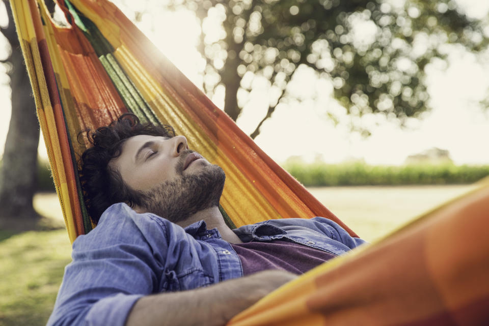 Man napping in hammock