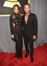 <p>Style/couple/life/everything goals, right?! John opted for a traditional black tux and coral pink shirt while Chrissy rocked a fitted, sheer black lace Macrame dress. </p>