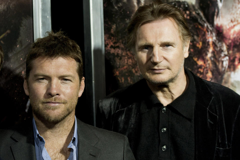 Actors Sam Worthington, left, and Liam Neeson attend the world premiere of "Wrath of the Titans" in New York, Monday, March 26, 2012. (AP Photo/Charles Sykes)