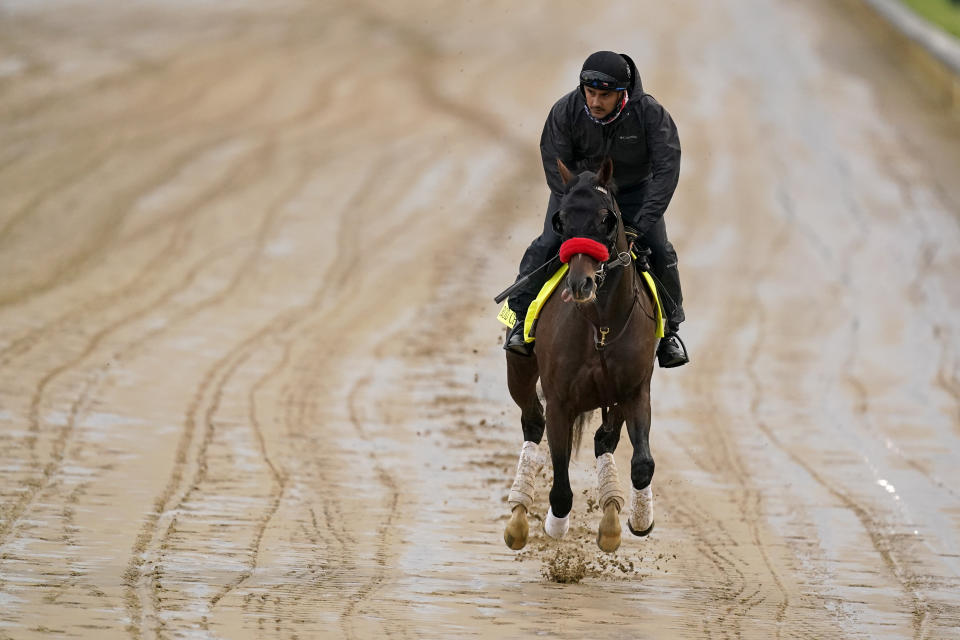 Kentucky Derby entrant Hot Rod Charlie works out at Churchill Downs Thursday, April 29, 2021, in Louisville, Ky. The 147th running of the Kentucky Derby is scheduled for Saturday, May 1. (AP Photo/Charlie Riedel)