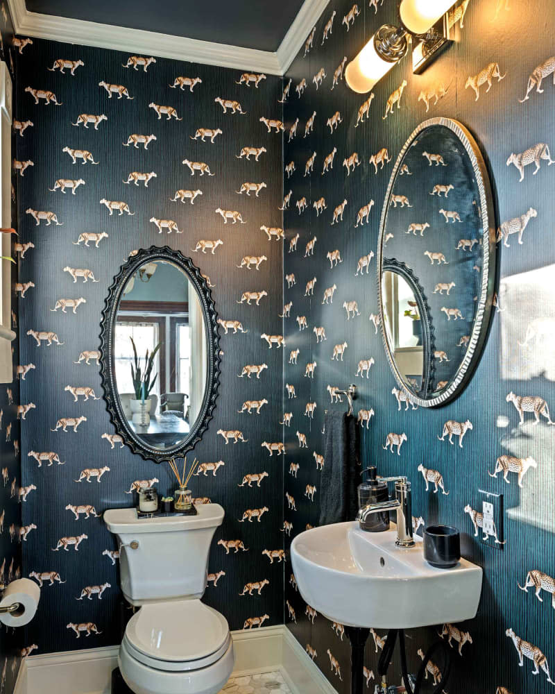 Animal print wallpaper in bathroom after renovation.