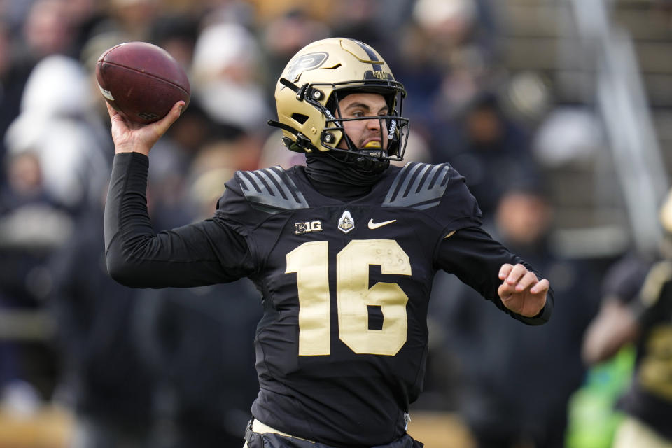 Purdue quarterback Aidan O'Connell (16) throws against Northwestern during the first half of an NCAA college football game in West Lafayette, Ind., Saturday, Nov. 19, 2022. (AP Photo/Michael Conroy)