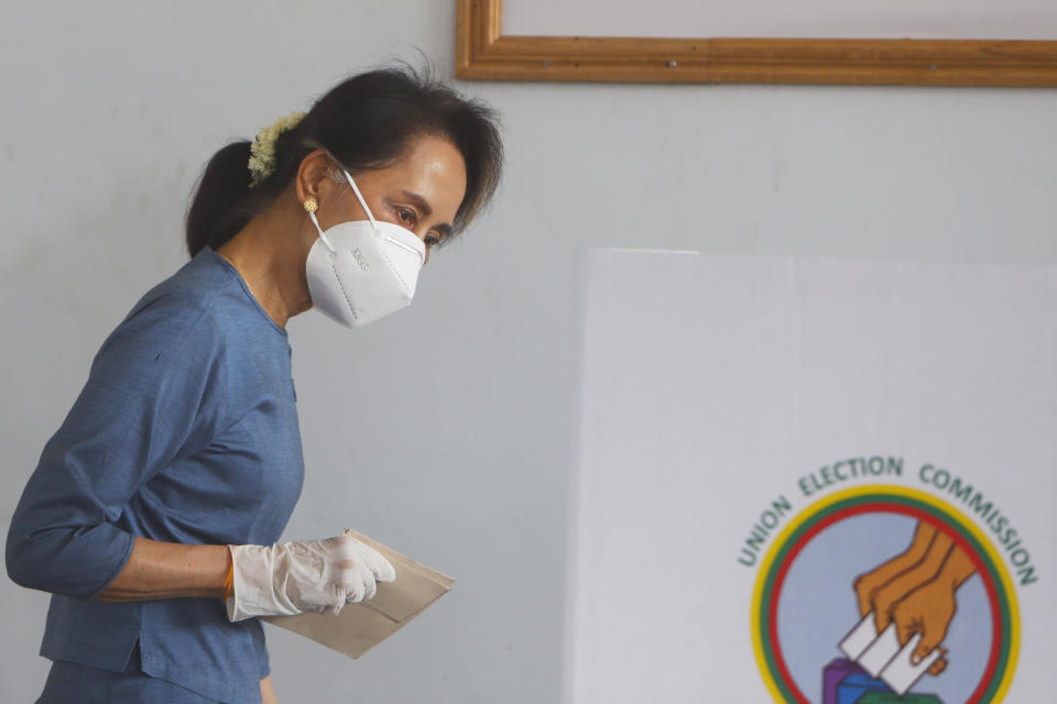 Myanmar's leader Aung San Suu Kyi prepares to make an early voting for upcoming Nov. 8 general election at Union Election Commission office in Naypyitaw, Myanmar Thursday, Oct. 29, 2020. (AP Photo/Aung Shine Oo)