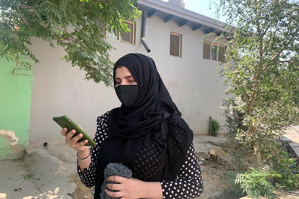 Farhat Popalzai, a Women's rights activist speaks during an interview with The Associated press after a protest in Kabul, Afghanistan, Saturday, Sept. 4, 2021. The Taliban have promised an inclusive government and a more moderate form of Islamic rule than when they last ruled the country from 1996 to 2001. But many Afghans, especially women, are deeply skeptical and fear a rollback of rights gained over the last two decades. (AP Photo/Kathy Gannon)