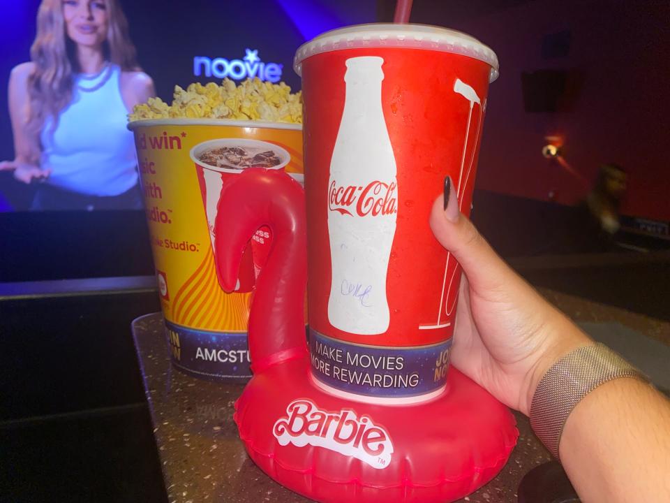 Pink Barbie drink floatie and popcorn bucket