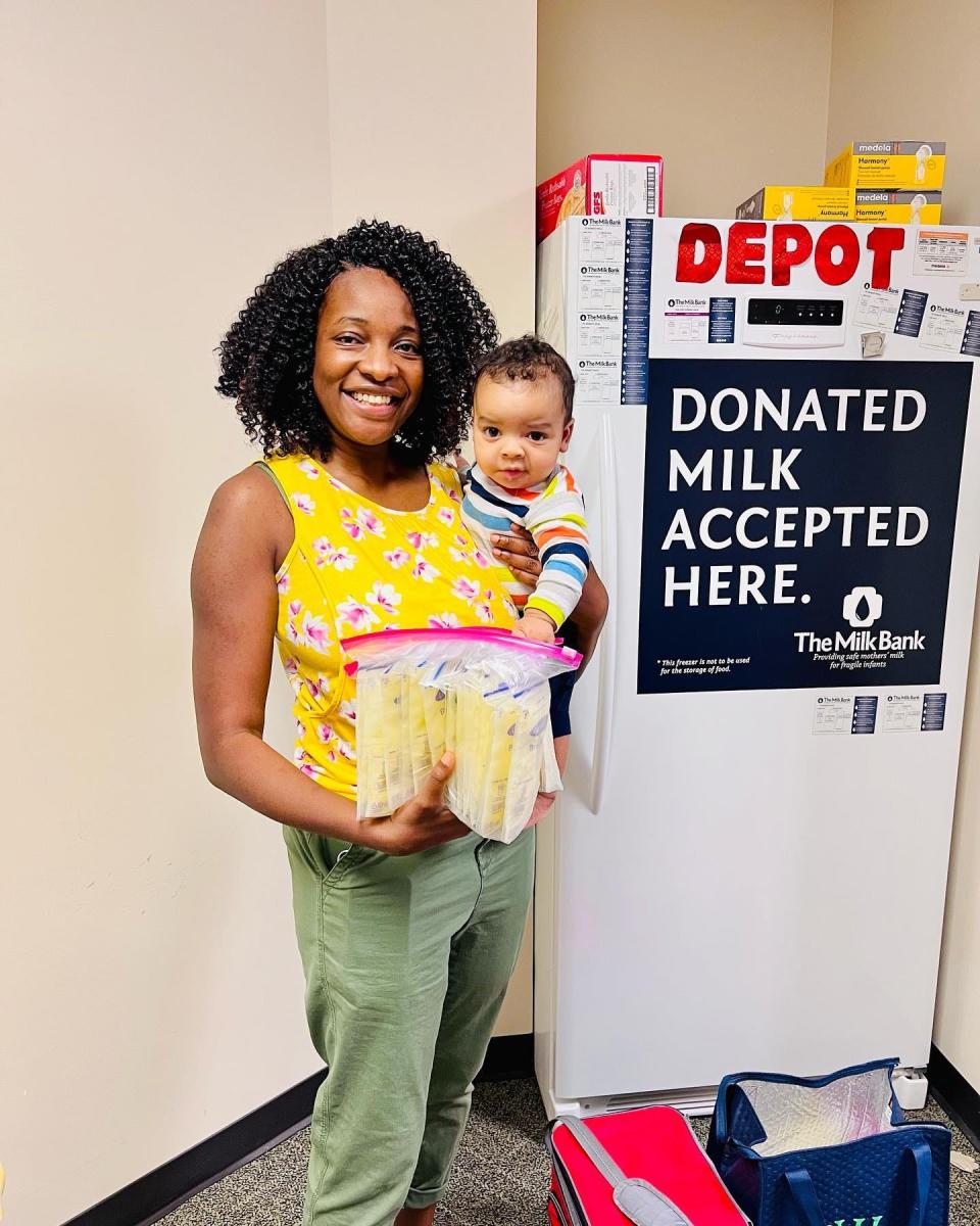Avril Pitt poses for a photo with her son outside of a designated Milk Bank donor milk drop-off location at Community North Hospital on May 9. Pitt has responded to other crisis but felt particularly compelled to donate her breast milk after the infant formula milk shortage earlier this year.