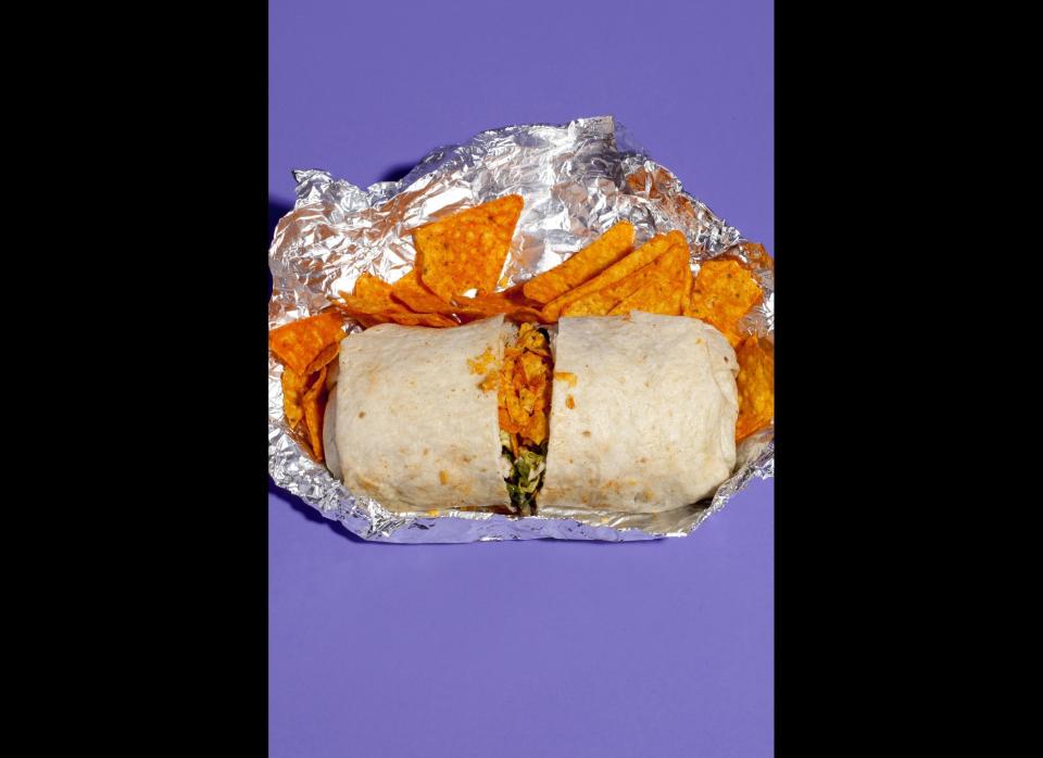 <strong>The Method:</strong> Since we were too bashful to ask our Chipotle assembly line wrapper to crumble the Doritos into the middle of the burrito, we ended up stuffing it ourselves ex post wrappo.     <strong>The Verdict:</strong> Funny! But not good-tasting, sadly. One taster said that the pairing was "good texturally," but most agreed that the subtle, natural flavors of a Chipotle burrito clashed with the artificiality of Doritos.