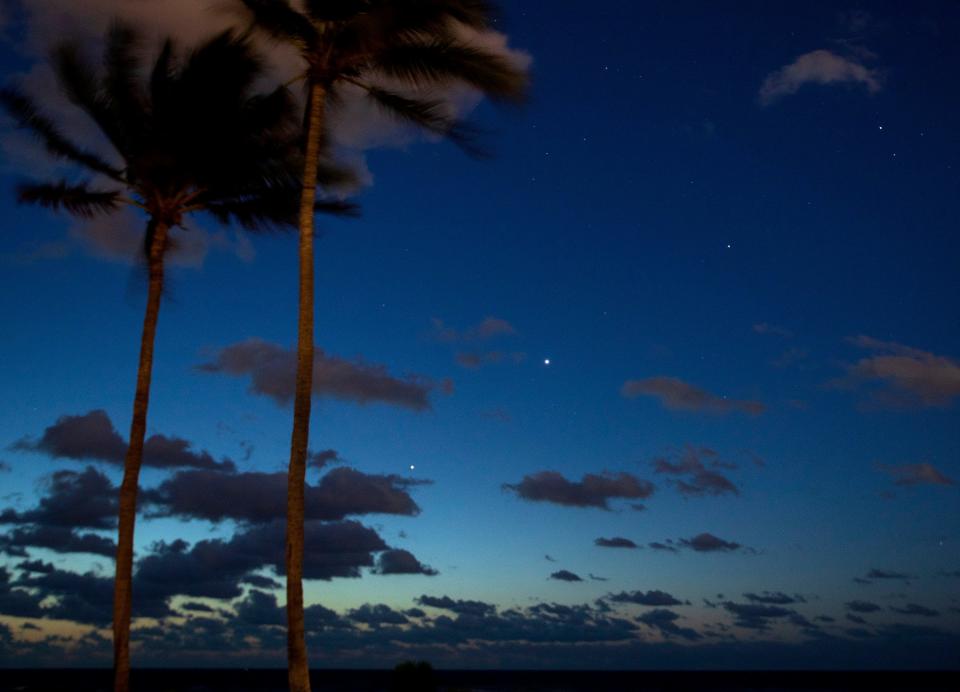 From bottom left to top right: Jupiter, Venus, Mars and Saturn lined up in the sky over Palm Beach 40 minutes before sunrise on April 20. Mercury will appear in the line in mid June 10, leading to a five-planet alignment.