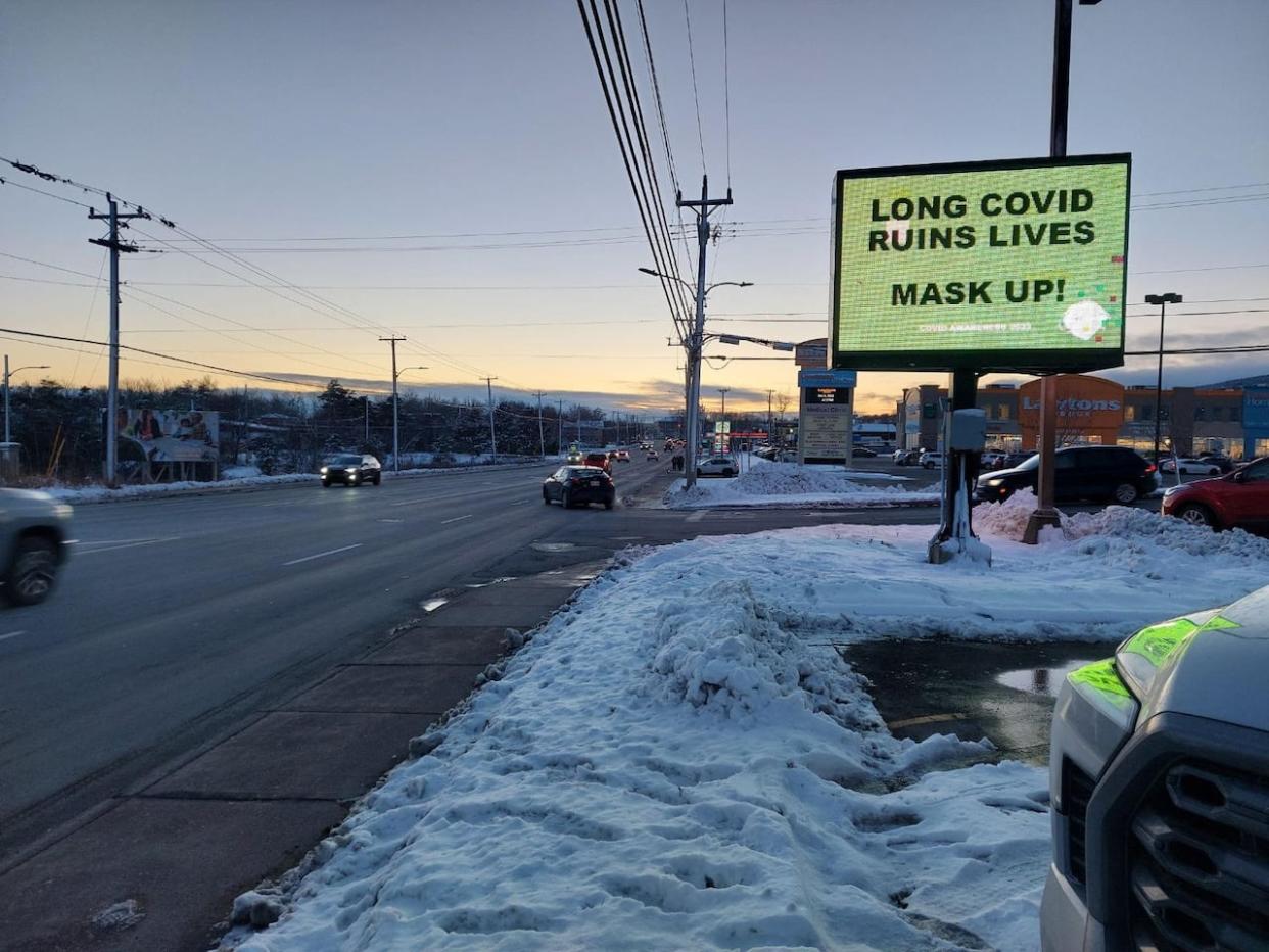 This billboard in St. John's, Newfoundland and Labrador featuring a warning about long COVID is the first of a cross-Canada group. (Submitted by Keith Muise - image credit)