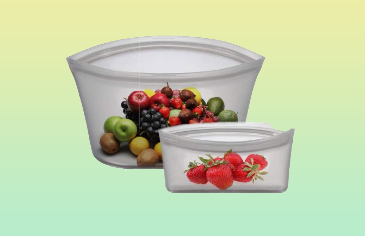 Two reusable zip lock bags with fruit inside