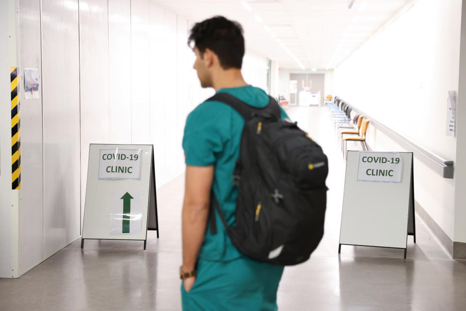 Doctor Django Nathan arrives at work before starting his shift in a coronavirus disease (COVID-19) ward at Westmead Hospital in Sydney, Australia, May 12, 2020.  