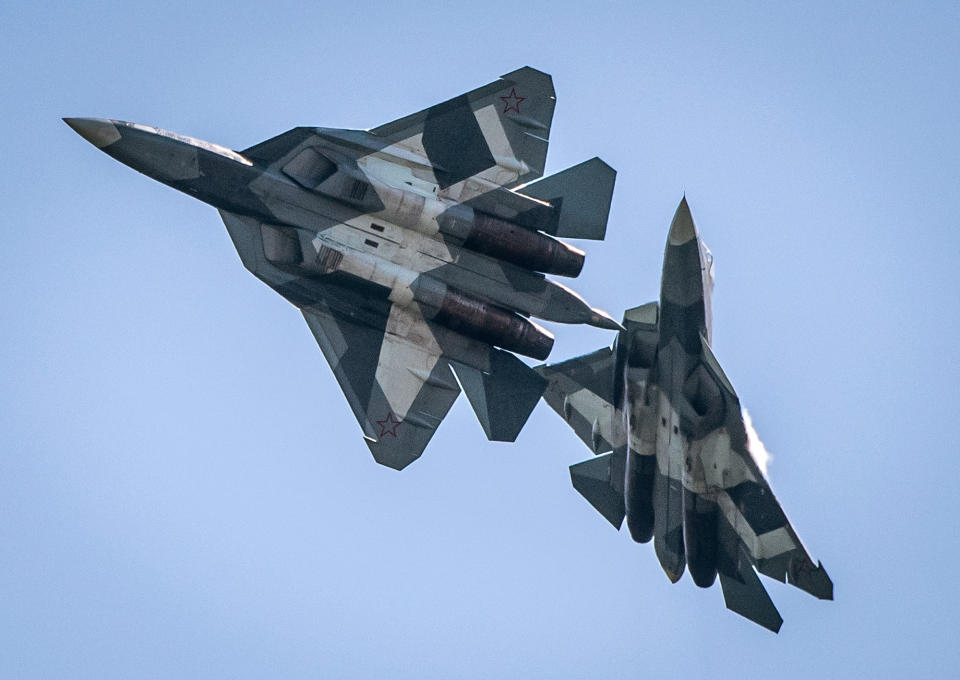 <p>A pair of Russian SU34 military jets take part in an exhibition flight on July 18, 2017 at the annual air show MAKS 2017 in Zhukovsky, some 40 km outside Moscow, Russia. (Photo: Mladen Antonov/AFP/Getty Images) </p>