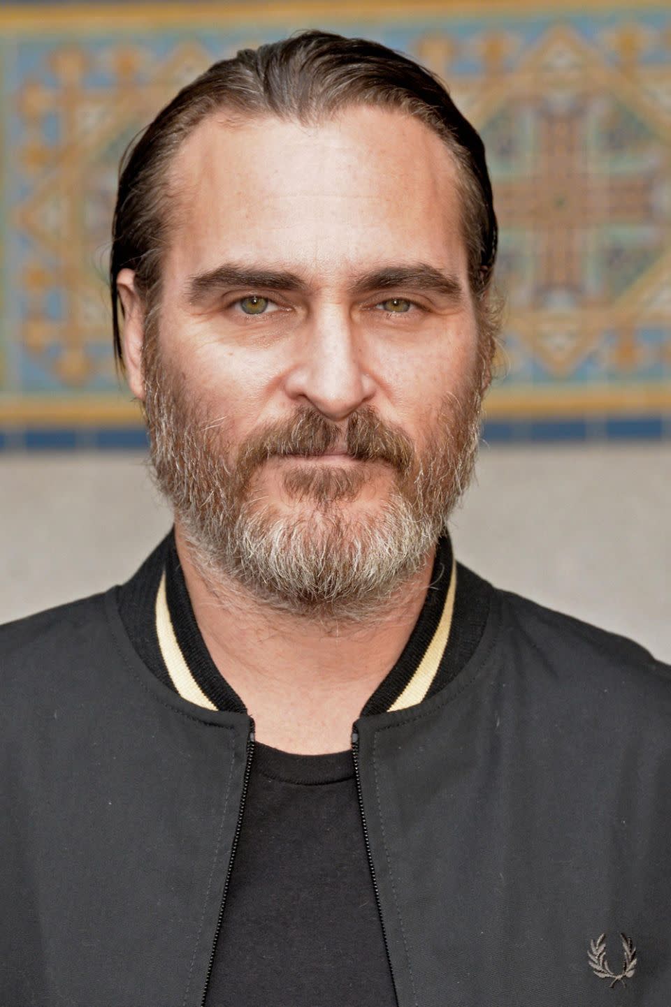 Actor Joaquin Phoenix was also raised in the cult. Source: Getty
