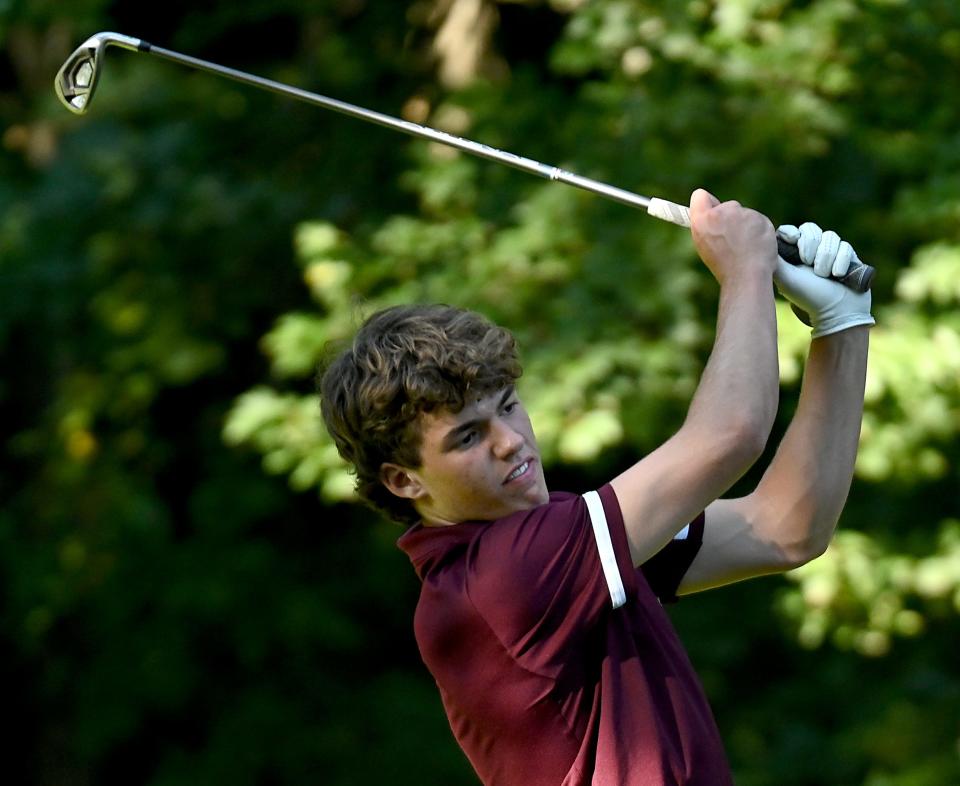 Algonquin golfer Brennan Rice follows through on a tee shot during a match against Groton-Dunstable at Juniper Hill Golf Course in Northborough, Sept. 8, 2022.  Rice hit a hole in one last week.  