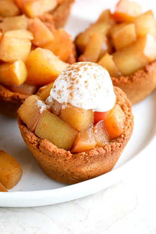 <p>Erin Lives Whole</p><p>This healthy mini apple pies recipe is a deliciously easy dessert made with a homemade cookie crust. These mini pies are made with almond flour, making them both gluten-free and low-carb! </p><p><strong>Get the recipe: <em><a href="https://www.erinliveswhole.com/healthy-mini-apple-pies/" rel="nofollow noopener" target="_blank" data-ylk="slk:Healthy Mini Apple Pies;elm:context_link;itc:0;sec:content-canvas" class="link ">Healthy Mini Apple Pies</a></em></strong></p>