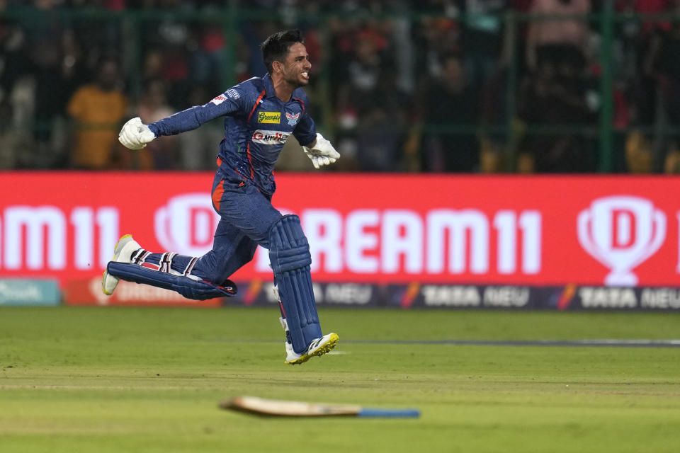 Lucknow Super Giants' Ravi Bishnoi runs to celebrate their win in the Indian Premier League cricket match between Royal Challengers Bangalore and Lucknow Super Giants in Bengaluru, India, Monday, April 10, 2023. (AP Photo/Aijaz Rahi)