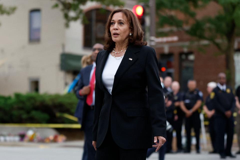 Vice President Kamala Harris visits the site of a shooting which left seven dead in Highland Park, Illinois, on July 5, 2022.