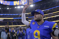 Los Angeles Rams quarterback Matthew Stafford walks off the field after the Rams defeated the Arizona Cardinals in an NFL wild-card playoff football game in Inglewood, Calif., Monday, Jan. 17, 2022. (AP Photo/Mark J. Terrill)