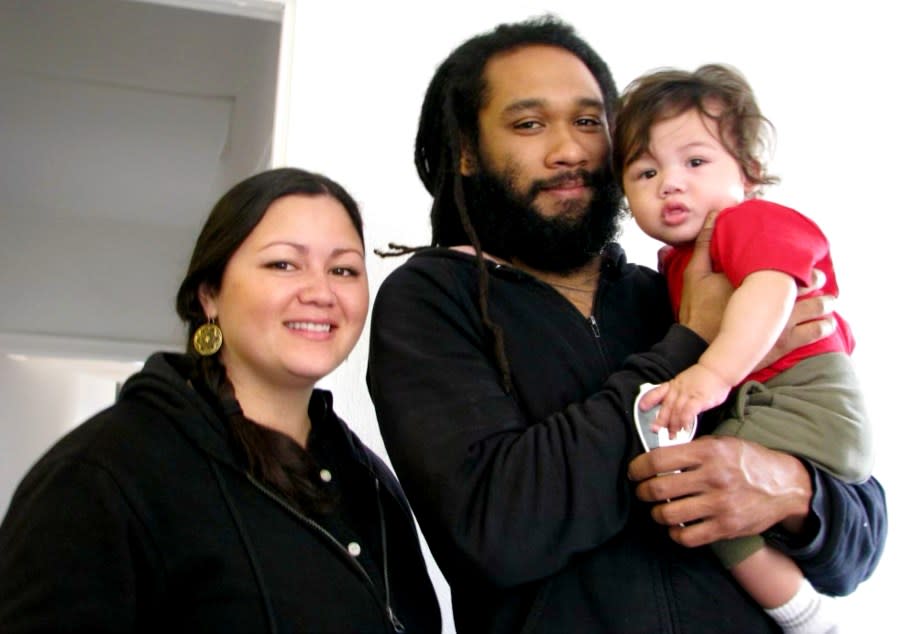 Angie Brey, Gregory Turnage, and their son pose for an undated family photo. (Image courtesy Angie Brey)