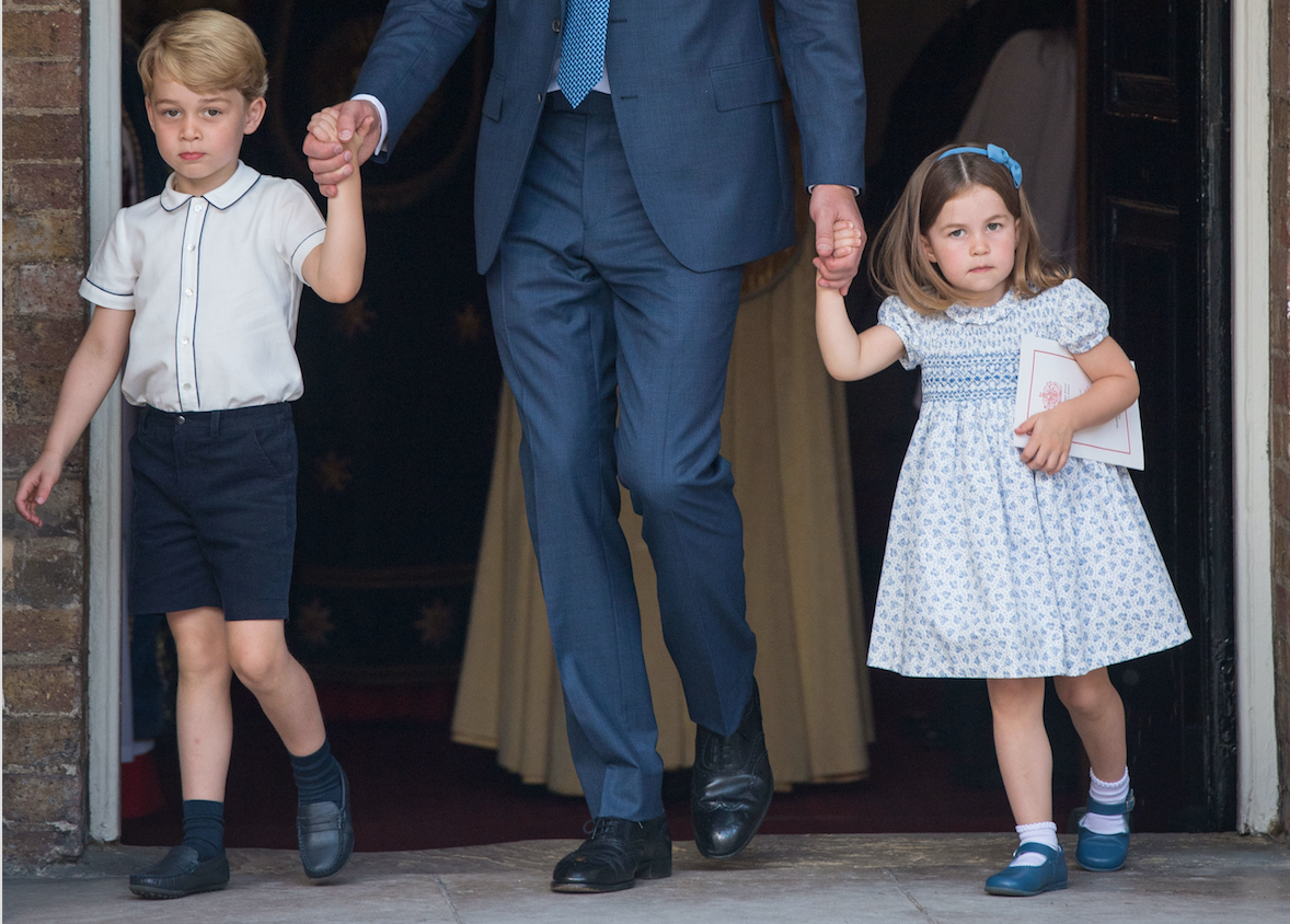 Prince George and Princess Charlotte leave the Chapel Royal, where their brother was christened. (Photo: Getty Images)