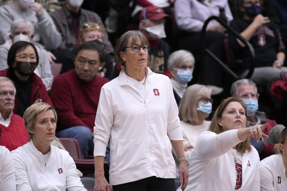 Stanford head coach Tara Vanderveer, center, watches during the second half of an NCAA college basketball game against Arizona, Monday, Jan. 2, 2023, in Stanford, Calif. (AP Photo/Tony Avelar)
