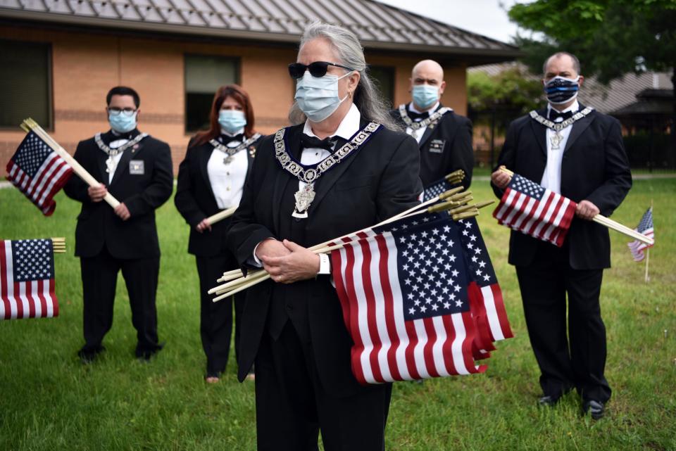 Cindy Zschoche and members of the Passaic Valley Elks Lodge prepare to honor each of veterans who have passed away from Covid-19 at the New Jersey Veterans Home in Paramus.