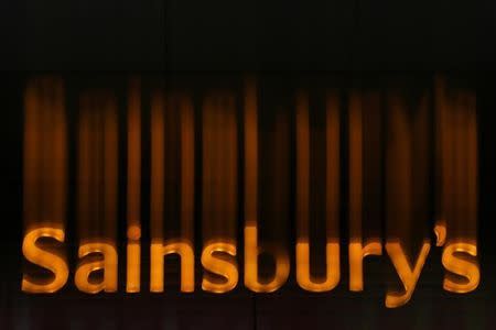 A Sainsbury's supermarket sign is seen in London January 6, 2015. REUTERS/Stefan Wermuth