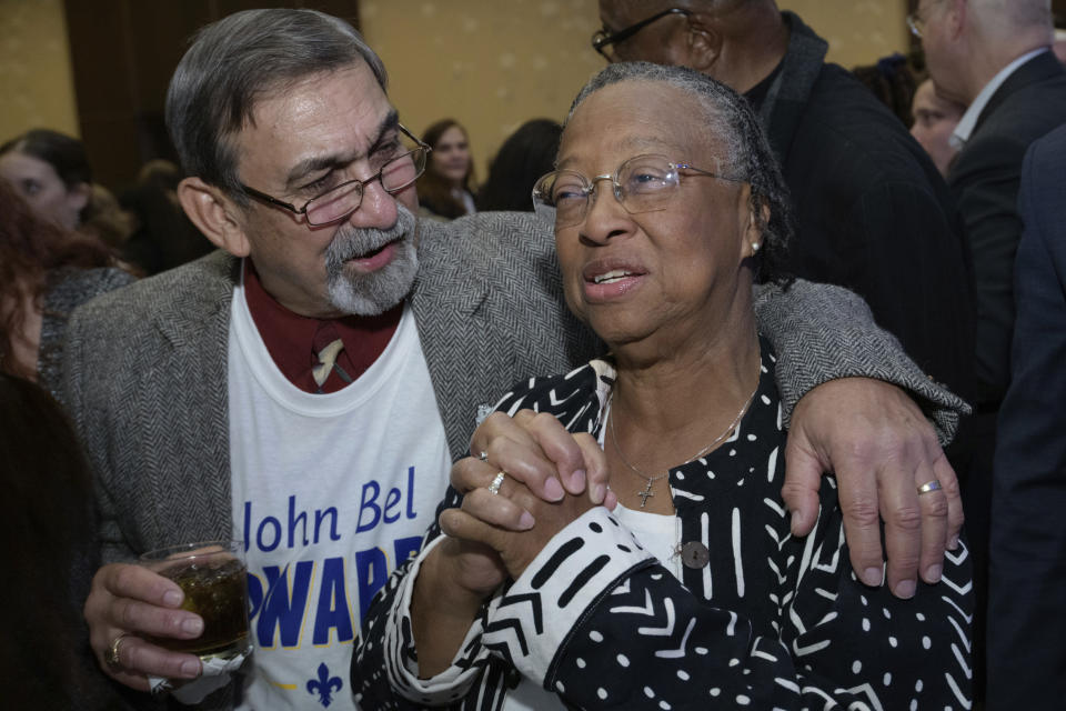 Supporters react as Louisiana Gov. John Bel Edwards arrives to address supporters at his election night watch party in Baton Rouge, La., Saturday, Nov. 16, 2019. On Saturday, voters reelected Edwards to a second term, as he defeated Republican businessman Eddie Rispone. (AP Photo/Matthew Hinton)