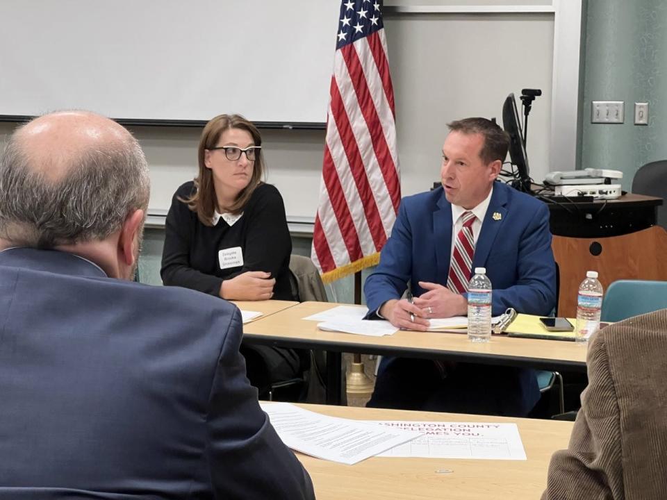 Del.-Elect Brooke Grossman, center left, listens to Sen. Paul Cordeman, center right, speak to representatives from the Washington County Board of Commissioners at Hagerstown Community College on Dec. 7, 2022.