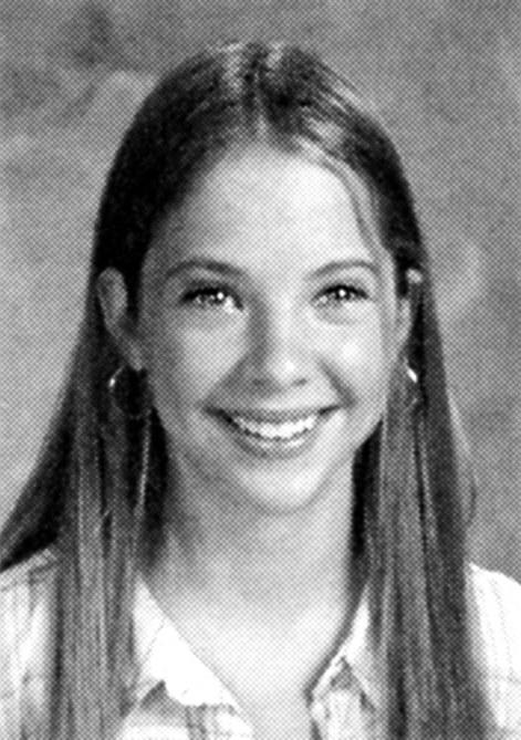Though she's changed a lot over the years, we can still tell this is Ashley Benson in 8th grade. We really love the middle part ... it's a pretty timeless look on her!