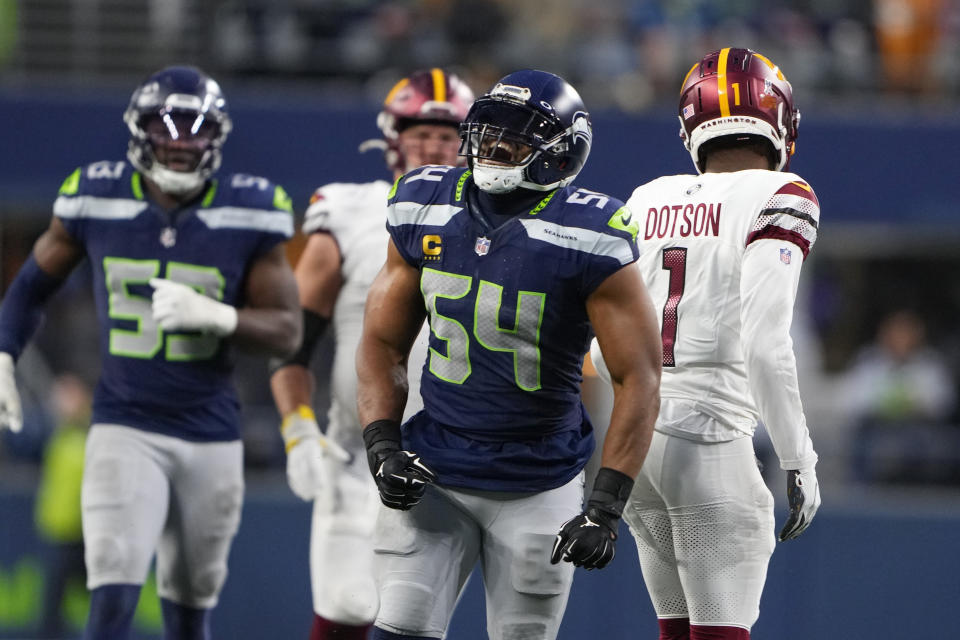 Seattle Seahawks linebacker Bobby Wagner (54) reacts after a forced incomplete pass by Washington Commanders wide receiver Jahan Dotson (1) in the second half of an NFL football game in Seattle, Sunday, Nov. 12, 2023. (AP Photo/Lindsey Wasson)