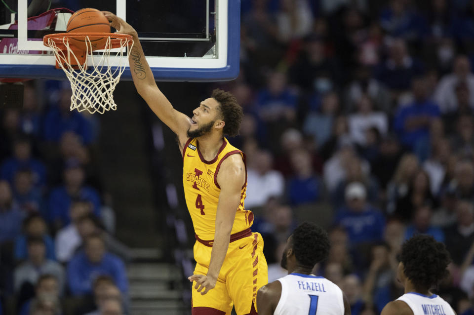 Iowa State's George Conditt IV (4) dunks against Creighton during the first half of an NCAA college basketball game Saturday, Dec. 4, 2021, at CHI Health Center in Omaha, Neb. (AP Photo/Rebecca S. Gratz)