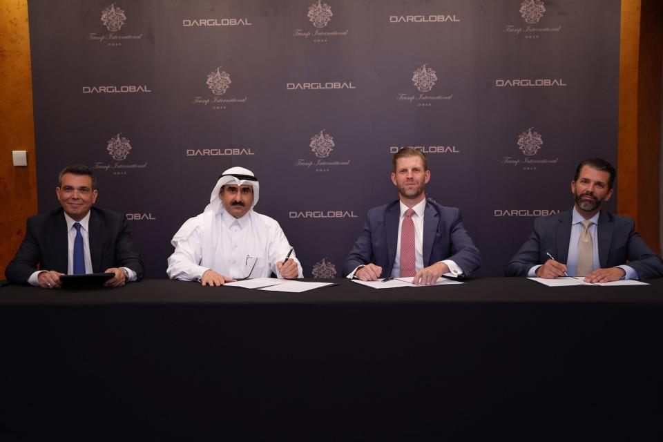 Ziad El Chaar, CEO of Dar Global, with Eric Trump and Donald Trump Jr.