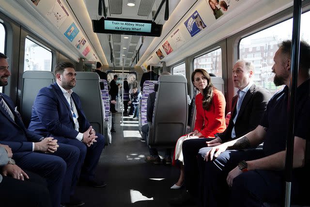 JORDAN PETTITT/POOL/AFP via Getty Images Kate Middleton and Prince William ride the Elizabeth Line in London