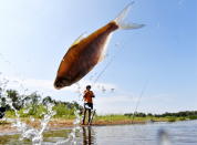 <p>Fishing in the Pripyat River in the village of Pererov in Zhytkavichy District. Viktor Drachev/TASS (Photo by Viktor Drachev\TASS via Getty Images) </p>