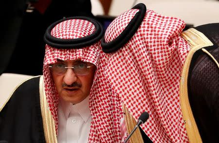 FILE PHOTO: Crown Prince Muhammad bin Nayef of Saudi Arabia confers with a member of his delegation during a high-level meeting on addressing large movements of refugees and migrants at the United Nations General Assembly in Manhattan, New York, U.S., September 19, 2016. REUTERS/Lucas Jackson/File Photo