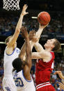 ATLANTA, GA - MARCH 23: Cody Zeller #40 of the Indiana Hoosiers is fouled while shooting over Kyle Wiltjer #33 and Doron Lamb #20 of the Kentucky Wildcats during the 2012 NCAA Men's Basketball South Regional Semifinal game at the Georgia Dome on March 23, 2012 in Atlanta, Georgia. (Photo by Kevin C. Cox/Getty Images)