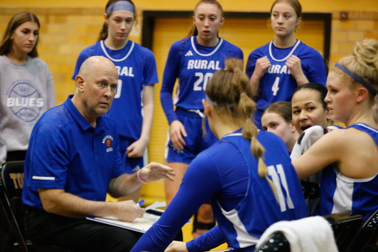 Washburn Rural coach Kevin Bordewick lays out plays during a timeout in the second half of the game Tuesday, Feb. 13, 2024, inside Topeka High School.