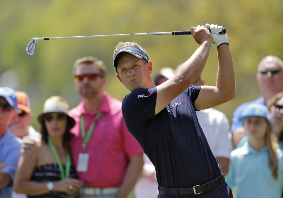 Luke Donald, of England, hits his tee shot on the second hole during the final round of the Valspar Championship golf tournament at Innisbrook, Sunday, March 16, 2014, in Palm Harbor, Fla. (AP Photo/Chris O'Meara)