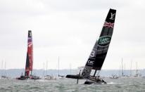 Britain Sailing - America's Cup 2016 - Portsmouth - 24/7/16 Land Rover BAR and Emirates New Zealand (L) during the race Reuters / Henry Browne Livepic