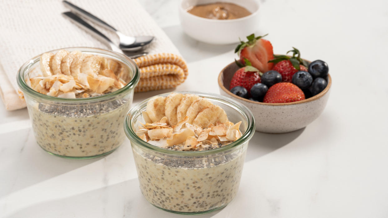  Two pots of Daily Overnight Oats on a table 