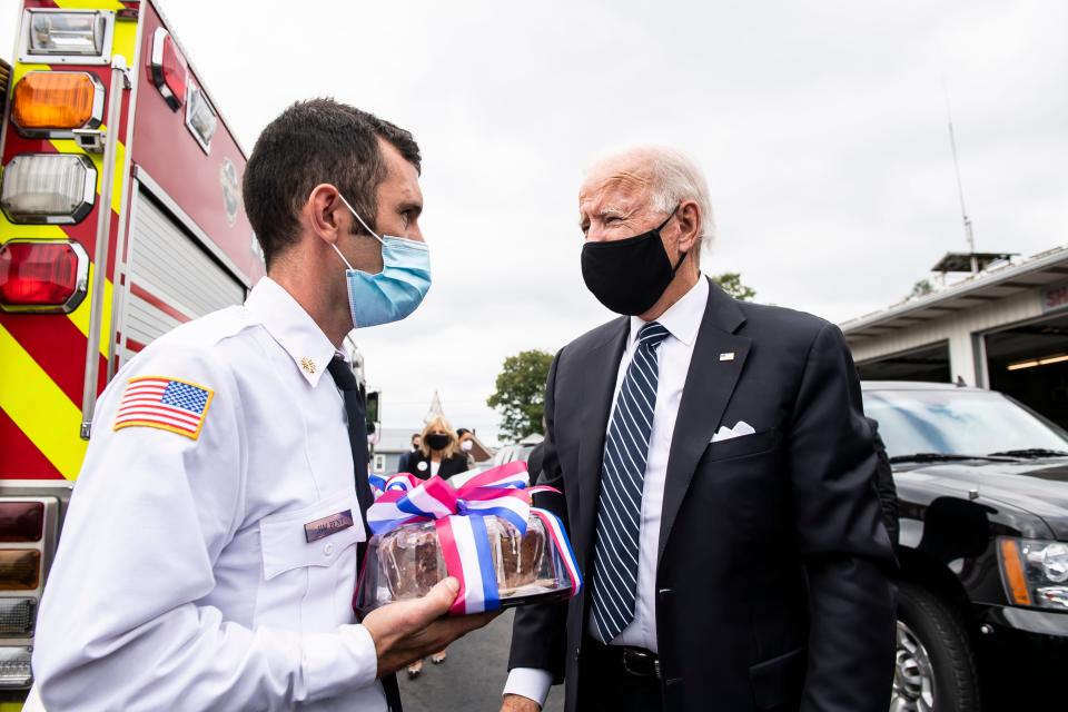 Former Vice President Joe Biden speaks with Shanksville Volunteer Fire Department Chief Jim Bent on Friday, September 11, 2020. Biden gifted the department several assorted baked goods and a couple packs of beer.