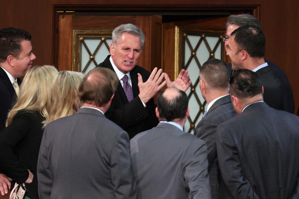 U.S. House Republican Leader Kevin McCarthy (R-CA) talks to members-elect in the House Chamber during the second day of elections for Speaker of the House at the U.S. Capitol Building on Jan. 4, 2023, in Washington, D.C.