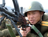 <p>A North Korean soldier of a unit of the Korean People’s Internal Security Forces takes a position during a live-fire exercise at an undisclosed place in North Korea, in this March 8, 2012 photo distributed March 10, 2012. (Korean Central News Agency via Korea News Service/AP) </p>