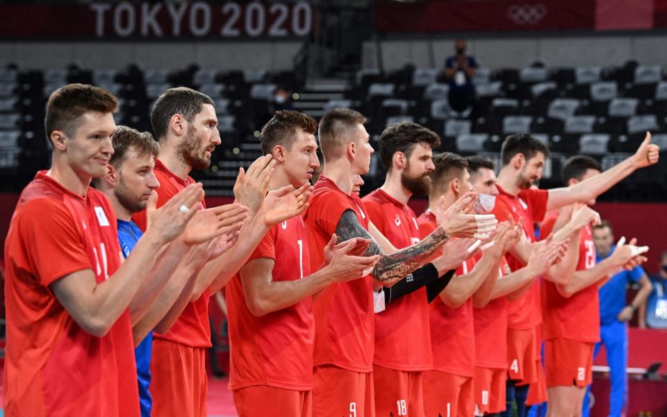 Russia's players applaud after their victory in the men's preliminary round pool B volleyball match between USA and Russia - Gigantic Russian presence at Tokyo Olympics makes mockery of Wada's doping ban