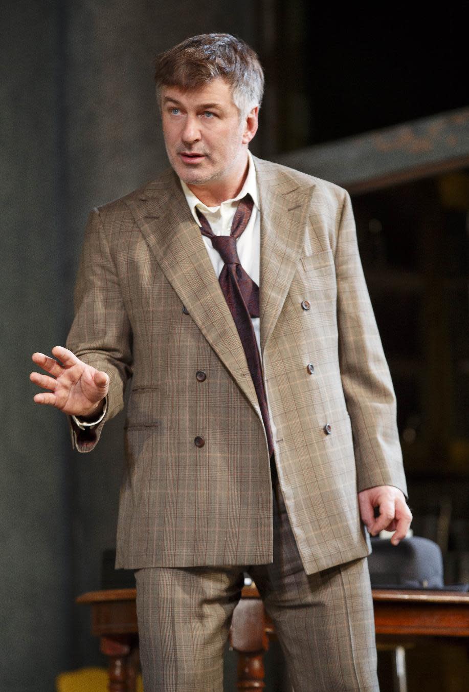 This theater image released by Boneau/Bryan-Brown shows Alec Baldwin during a performance of "Orphans," at the Gerald Schoenfeld Theatre in New York. (AP Photo/Boneau/Bryan-Brown, Joan Marcus)