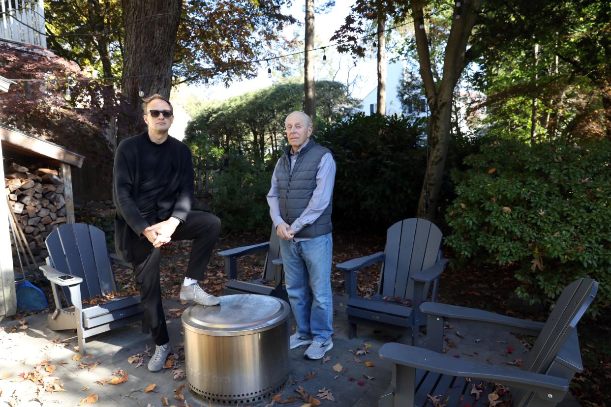 Mount Vernon resident Gabriel Thompson, left, and his neighbor Joseph Pisano stand in Thompson's yard in Mount Vernon Nov. 6, 2023. Their yards get flooded when it rains and they say it's because of the Bronxville Field Club's development over the years.