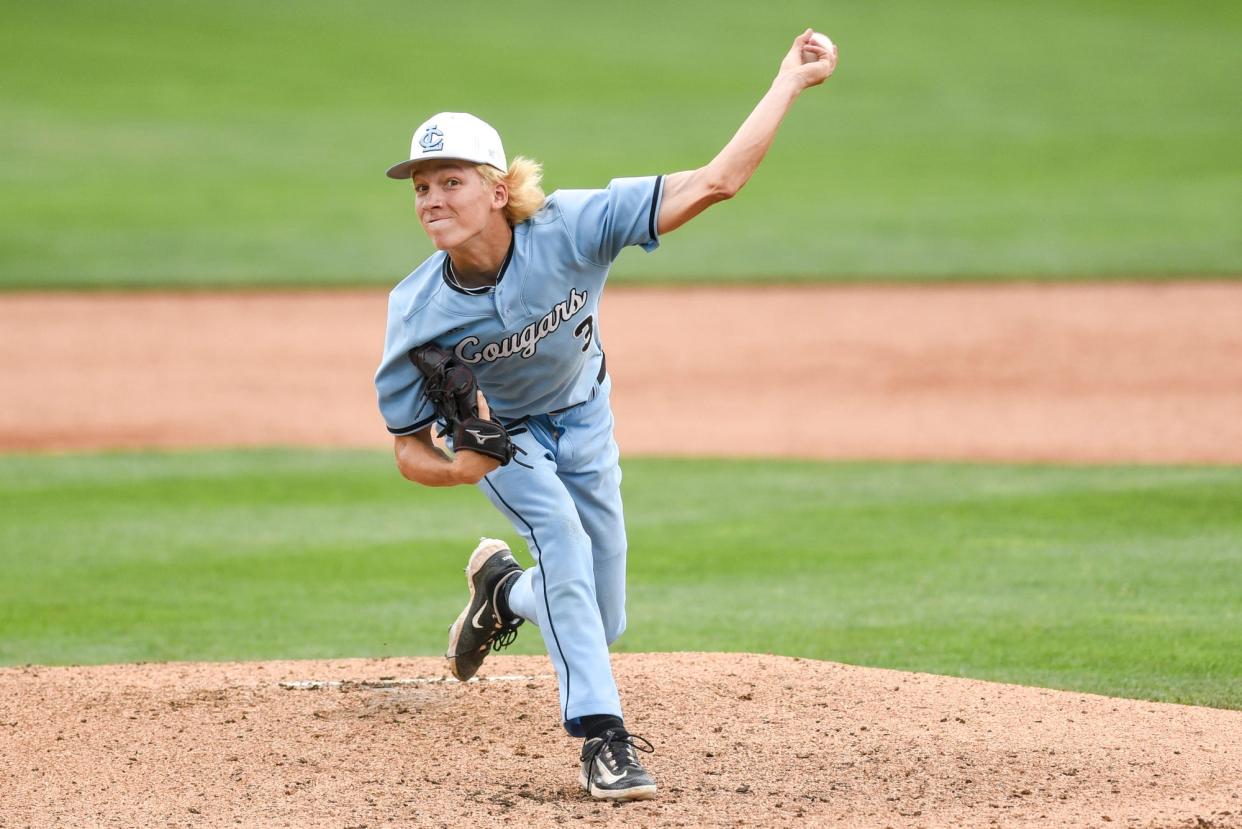Lansing Catholic's Drew Tolfree pitches to an Algonac batter during the first inning on Thursday, June 15, 2023, at McLane Stadium on the MSU campus in East Lansing.