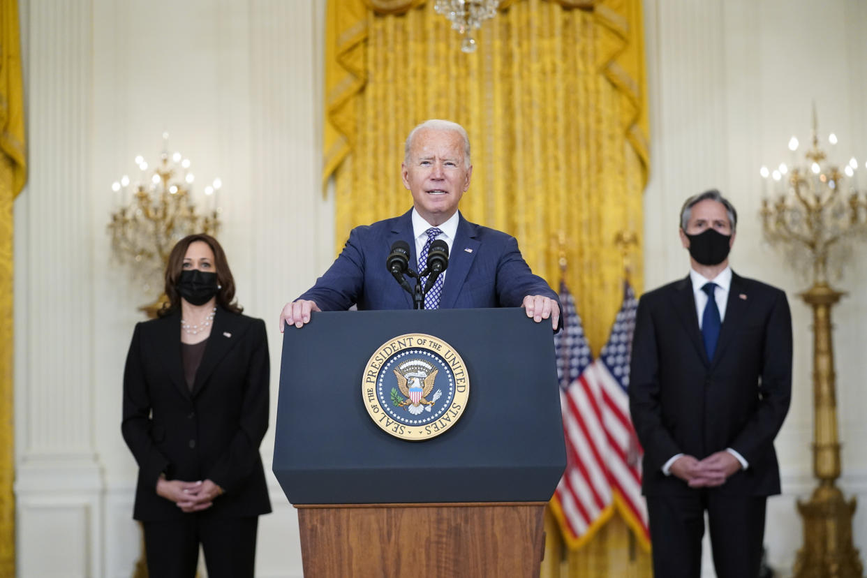 President Biden, at the White House with Vice President Kamala Harris, left, and Secretary of State Antony Blinken, right, discusses the evacuation of American citizens and vulnerable Afghans from Kabul.